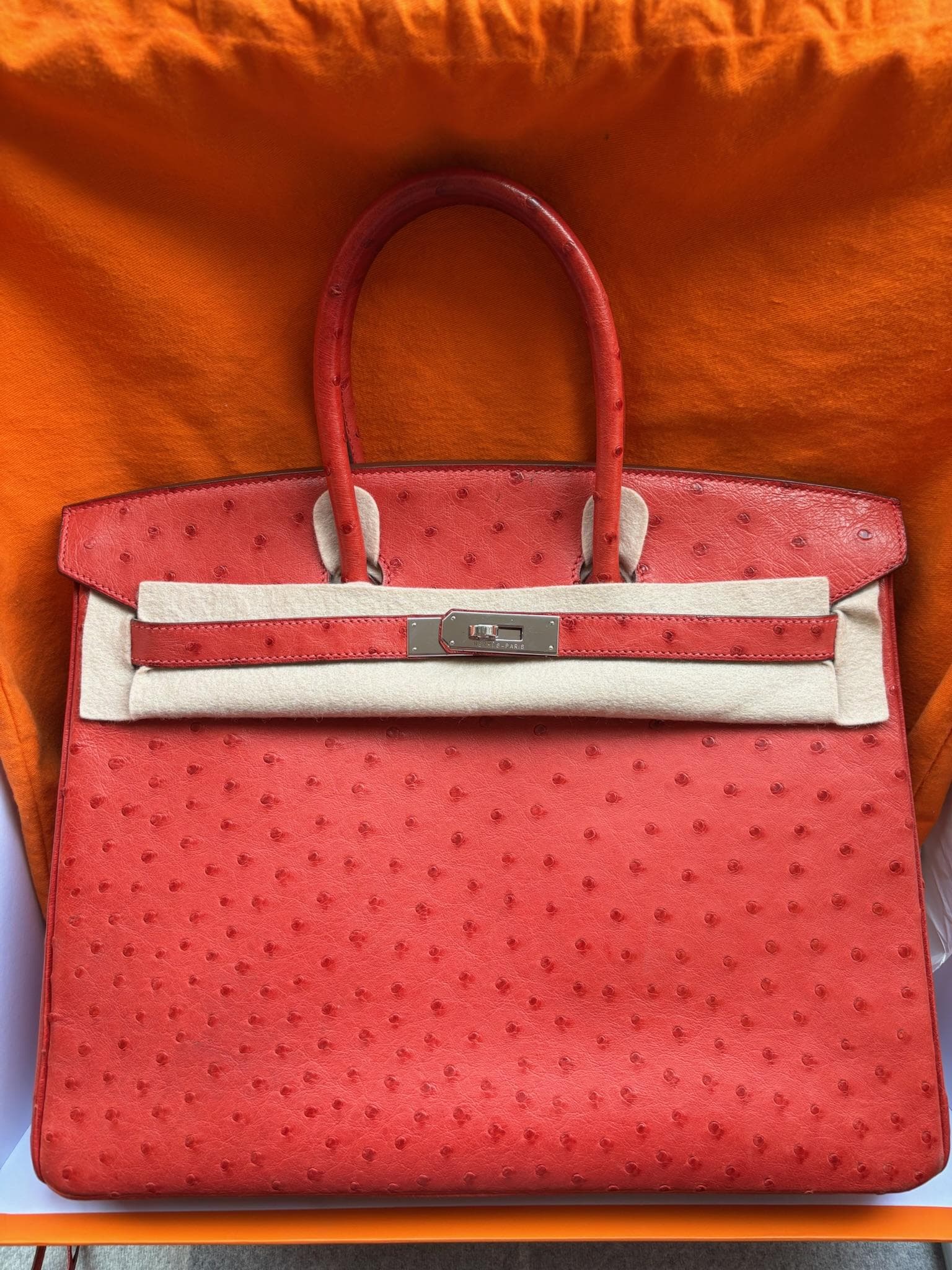 Hermès Birkin 35 in Rouge Casaque Ostrich PHW hardware — front view