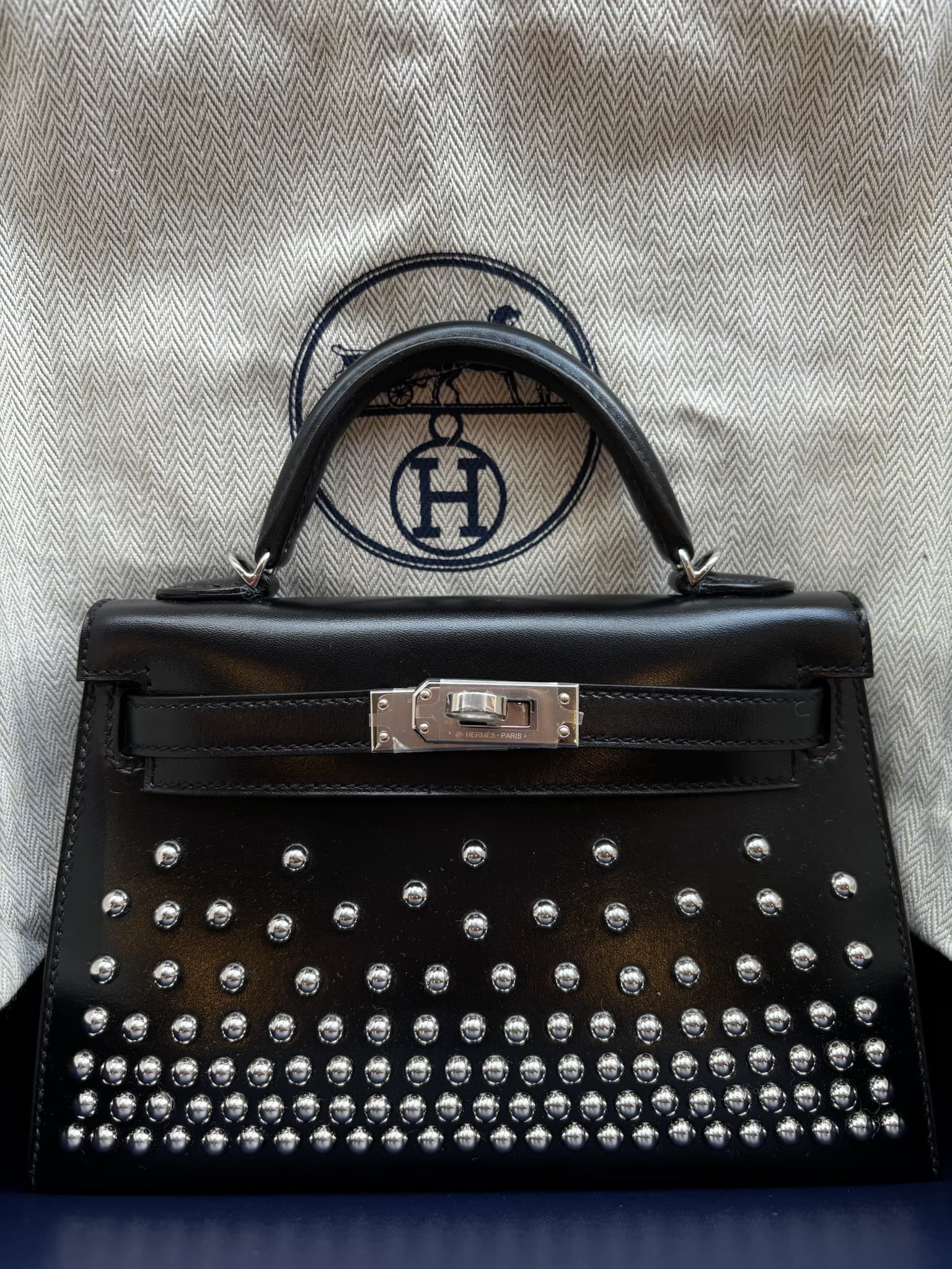 Hermès Kelly Mini Mini in Black Box Calf PHW hardware — front view