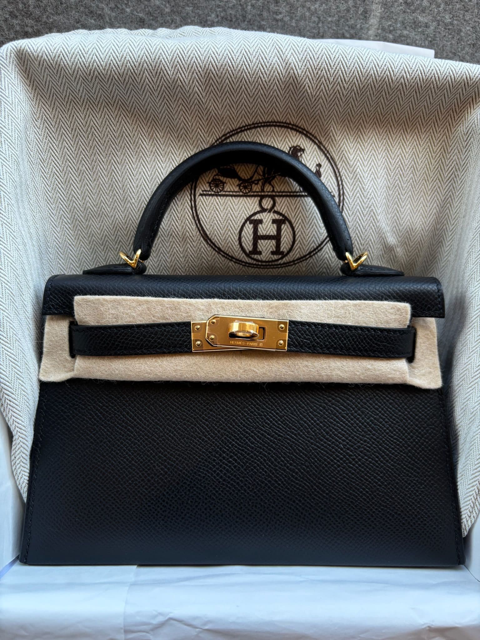 Hermès Mini Kelly II in Black Epsom GHW hardware — front view