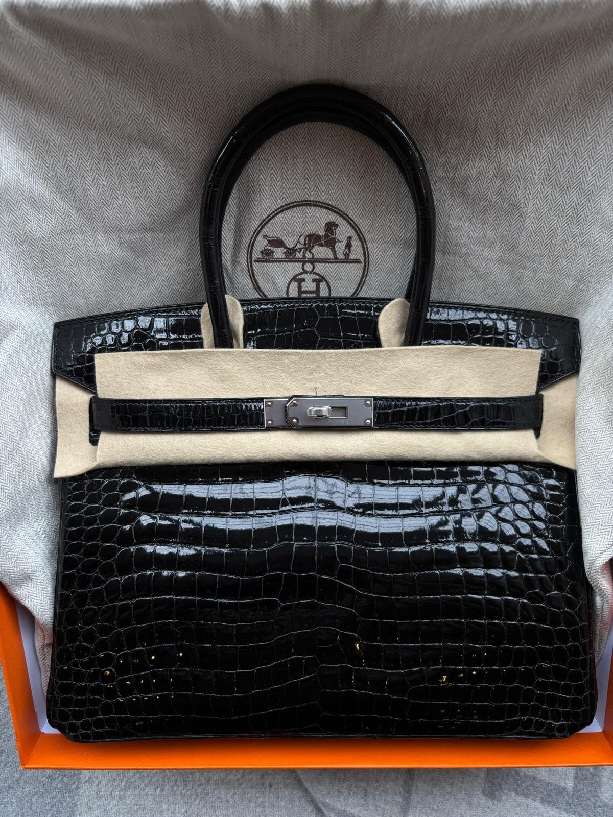 Hermès Birkin 30 in Black Shiny Porosus Crocodile PHW hardware — front view